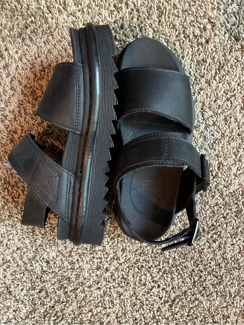 Dr. Martens Voss platform sandals, featuring a distinctive ripple tread sole